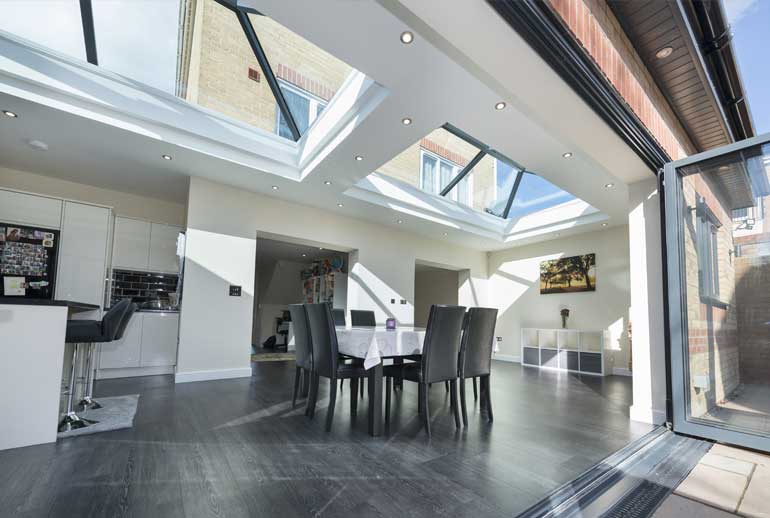 Ultrasky glazed roof lantern bringing overhead daylight into an interior